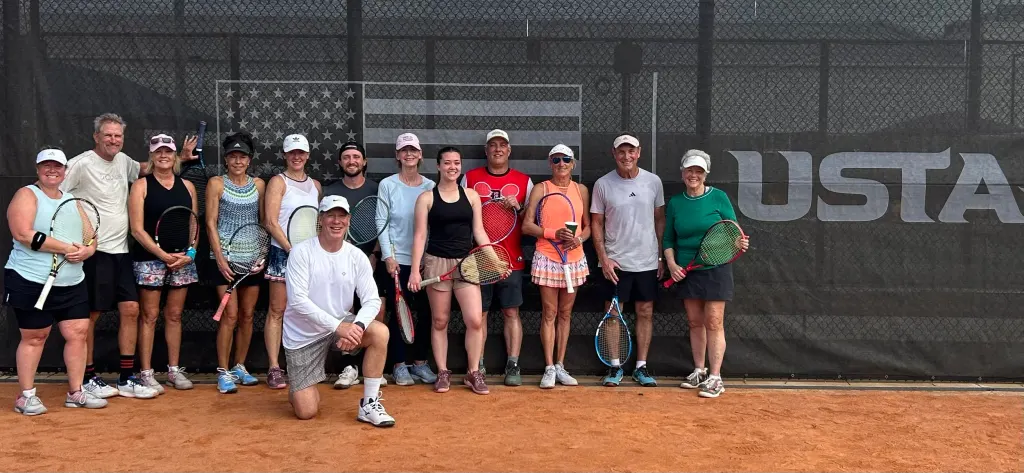 High-energy group clinic session with Coach Mike Moriarty — illustrative