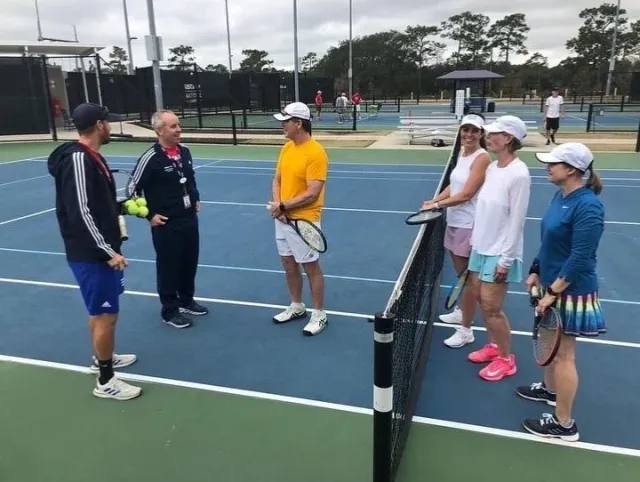 Coach Mike Moriarty leading a drill session on the Dalton Ranch courts